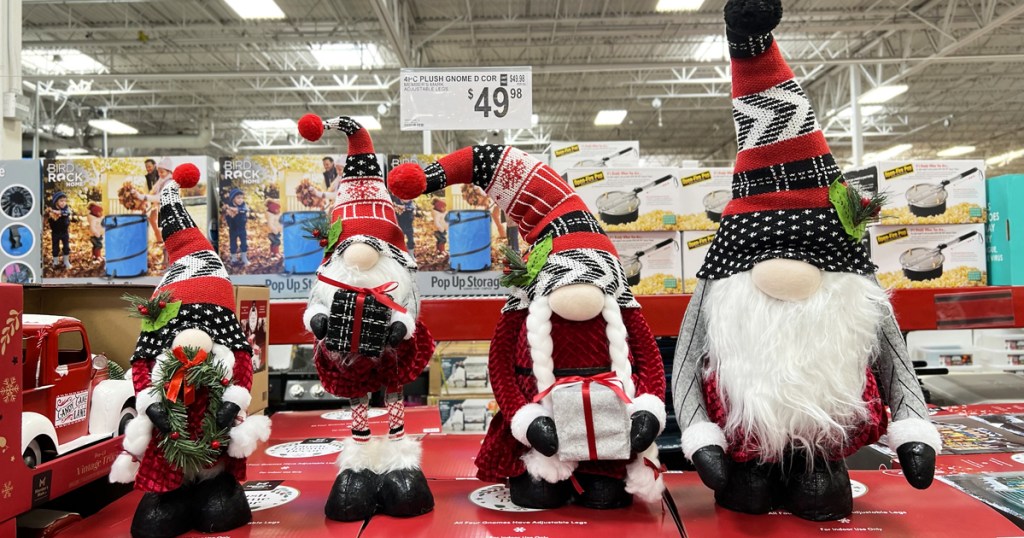 set of christmas gnomes on display in store
