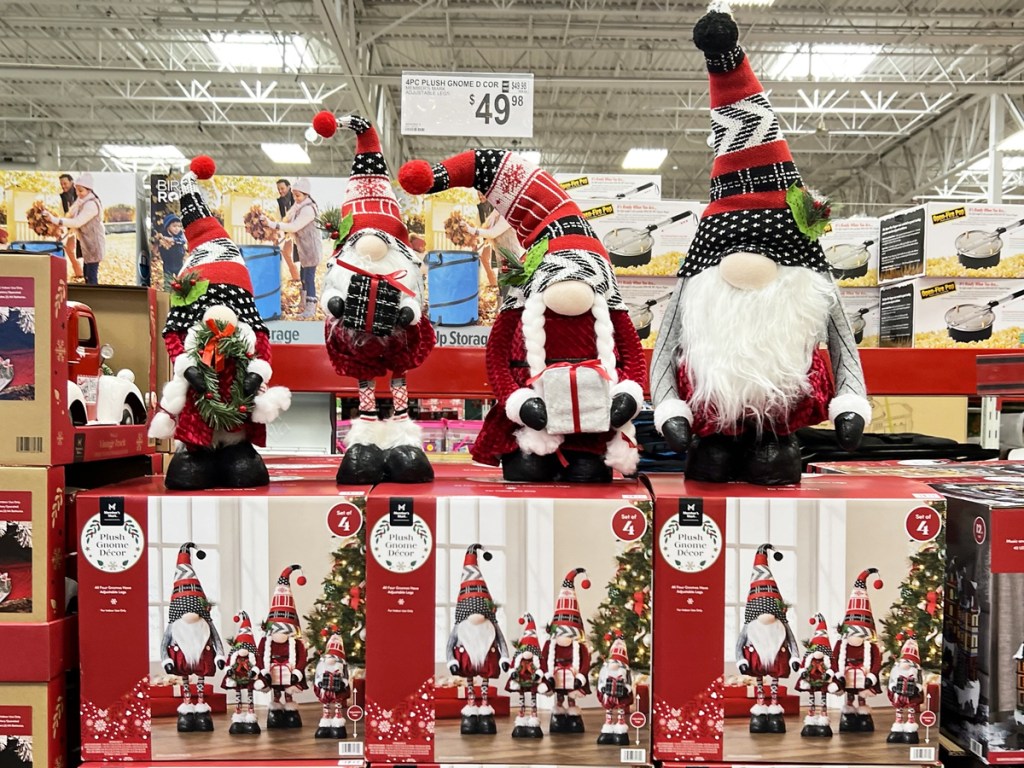set of christmas gnomes on display in store