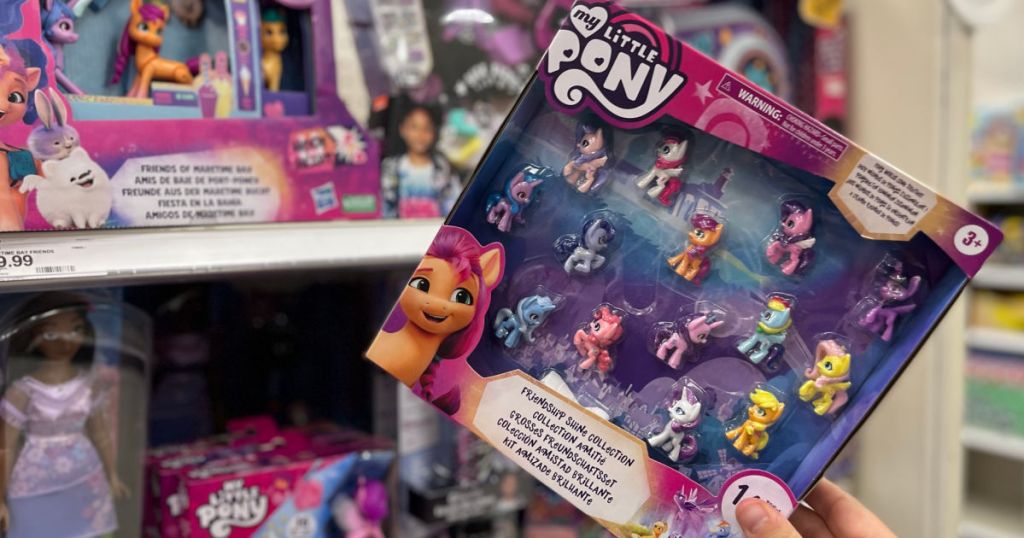 hand holding pony toy