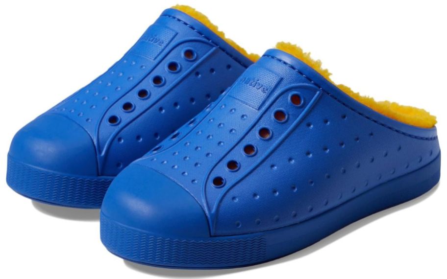A pair of blue Native kids shoes