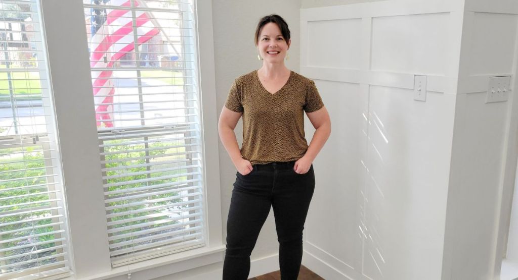 woman wearing brown and black v-neck tee
