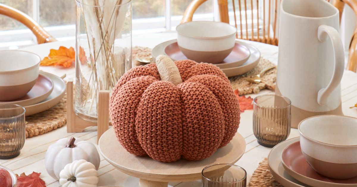 Orange Knit Pumpkin in center of decorated table for fall