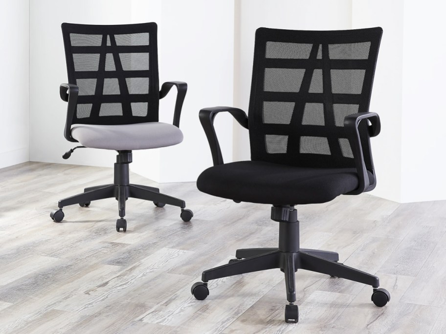 black and grey office chairs with mesh backs