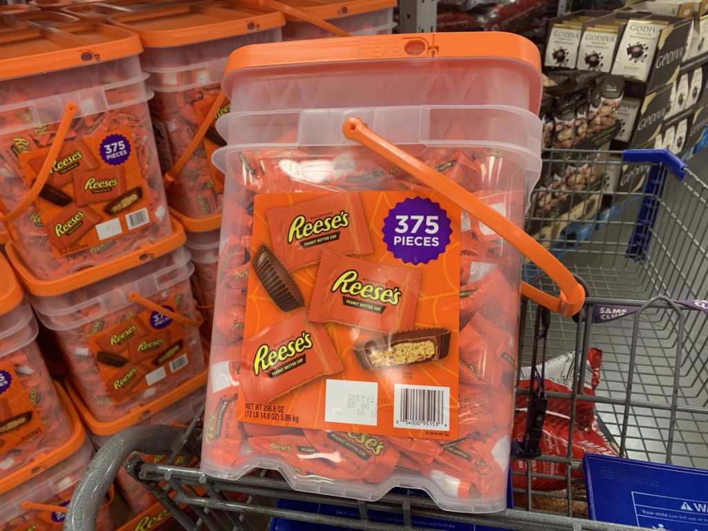 huge bucket of Reeses Peanut Butter Cups in sam's Club cart
