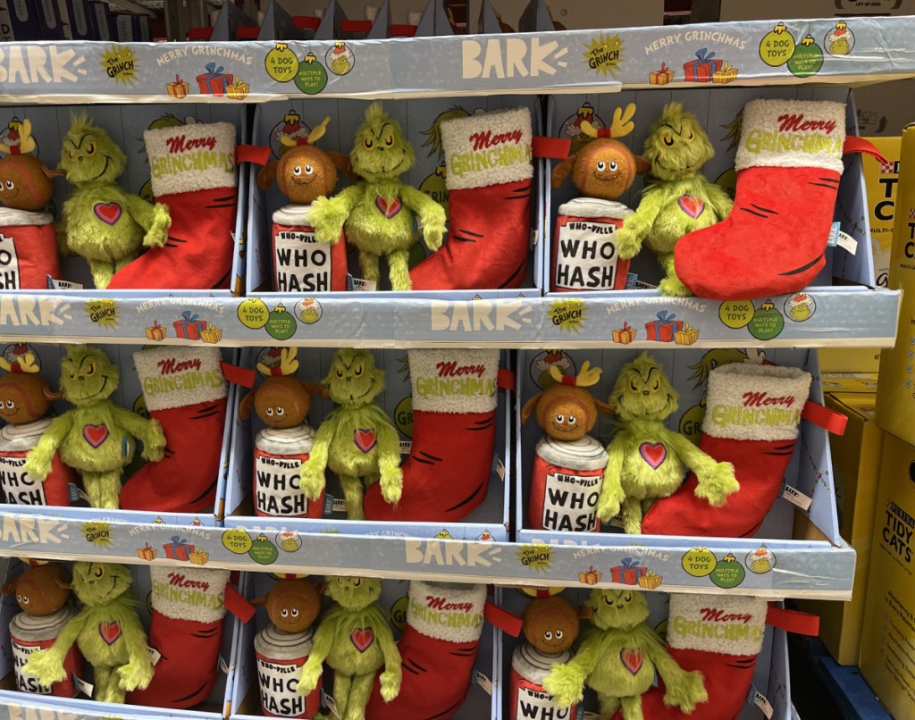 in-store display of Grinch themed dog toy sets