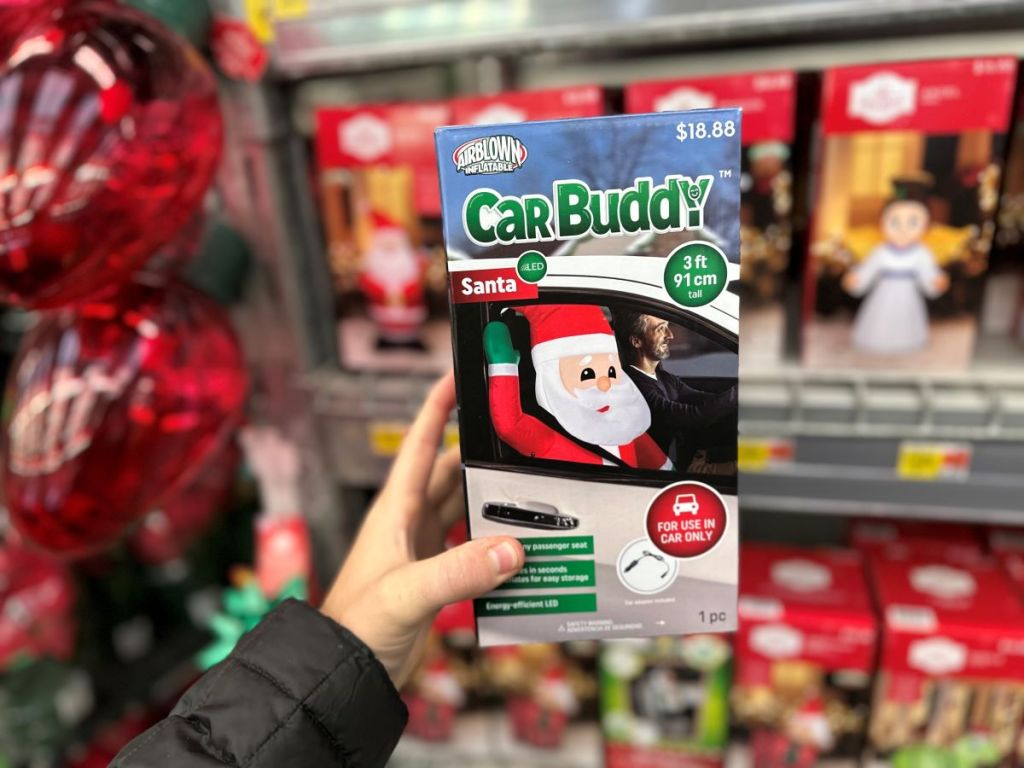 hand holding a Santa Car Buddy