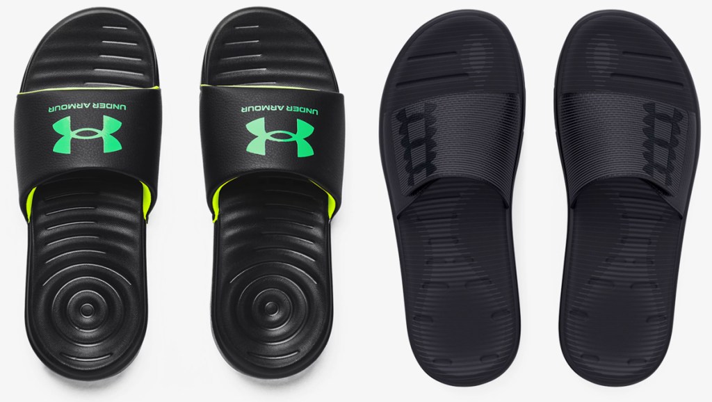 two pairs of under armour slides