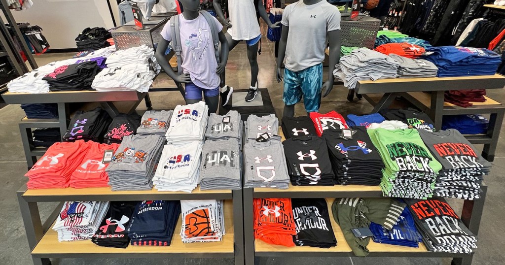 display of under armour tees in store