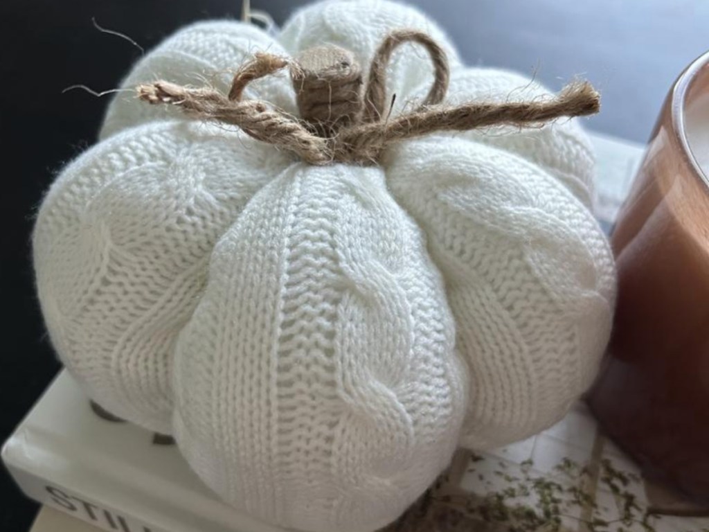 white knit pumpkin on tabletop