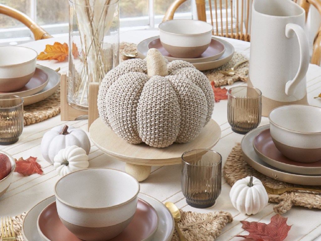 White Knit Pumpkin in middle of table decorated for fall