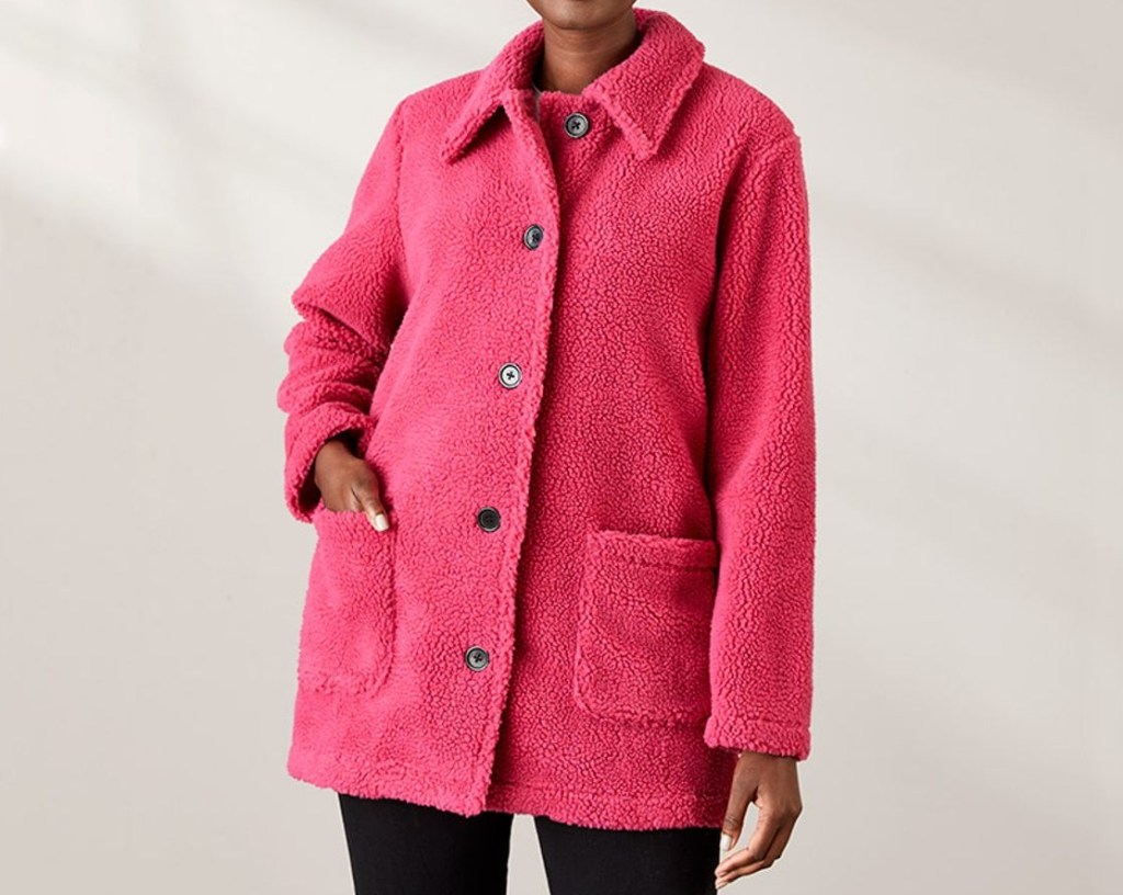 Woman wearing a pink coat