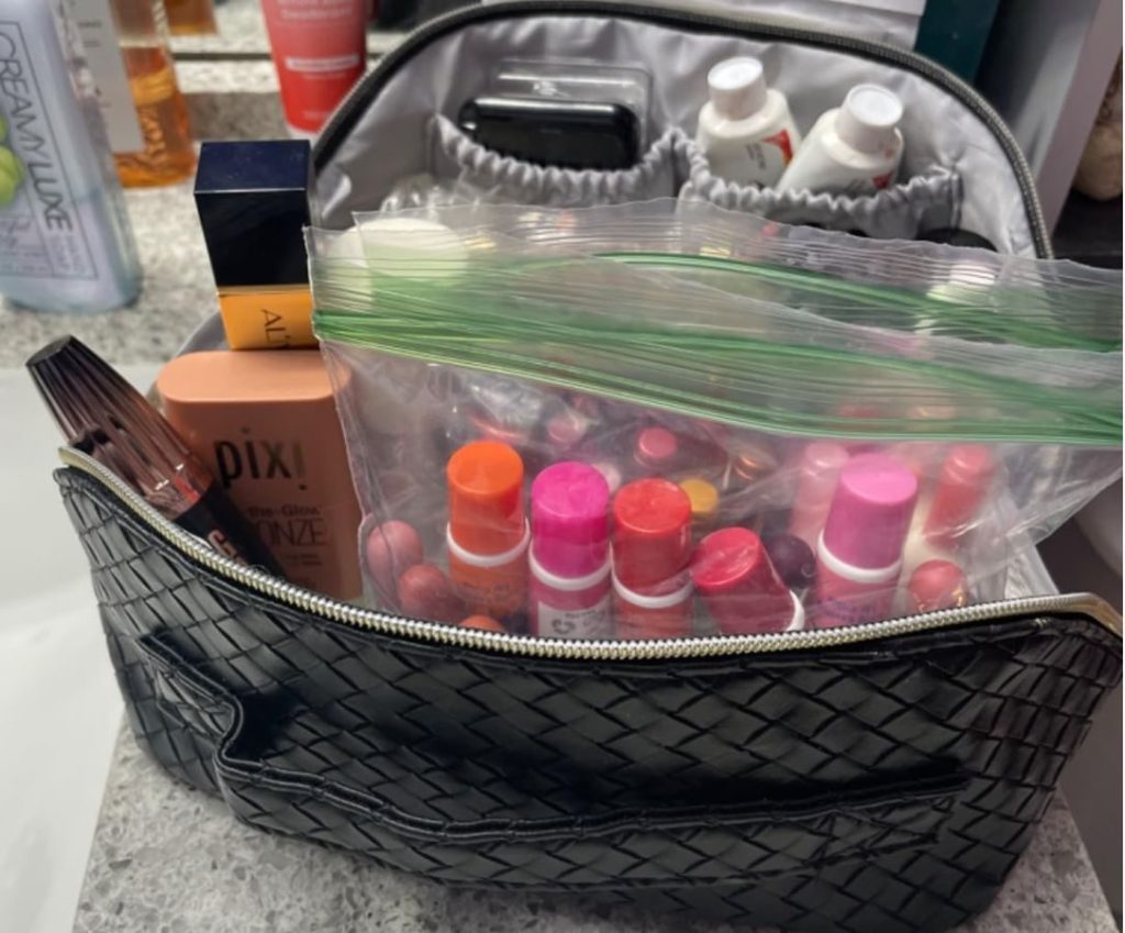 A Zauknya makeup bag filled with cosmetic items