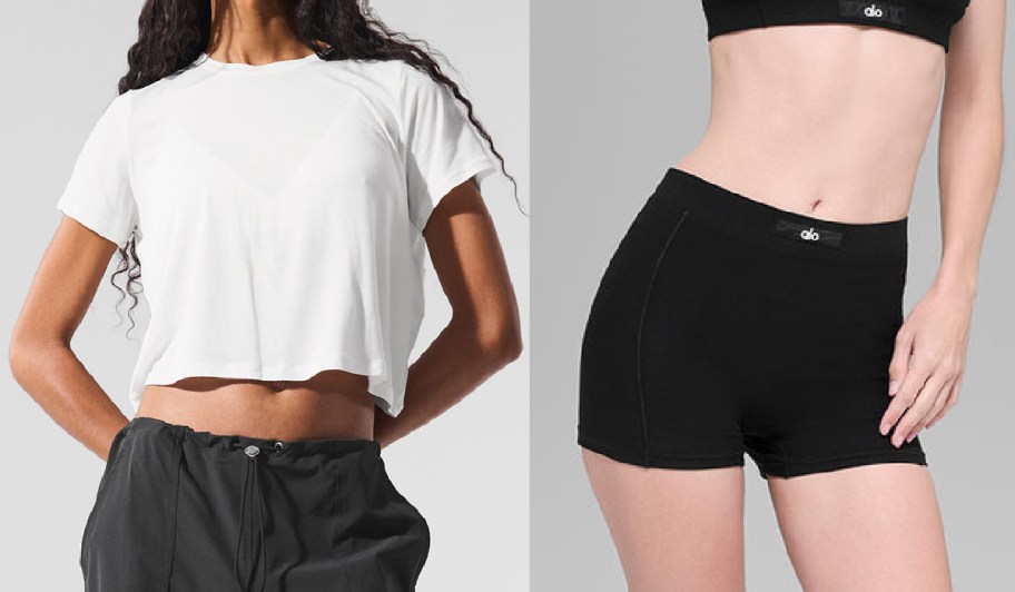 Two women are shown modeling sportswear. The left wears a white cropped T-shirt and black pants; the right wears a black sports bra and shorts.