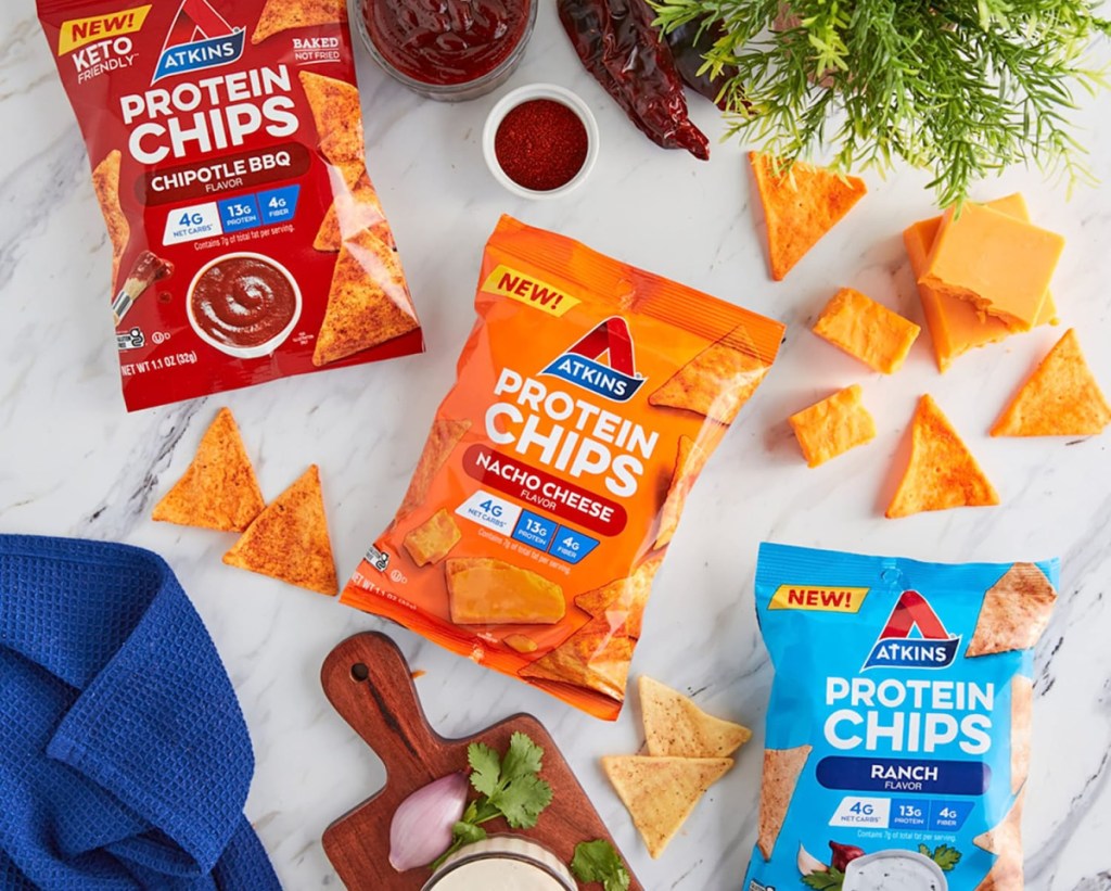 atkins snacks protein chips in and out of packaging on a flat surface
