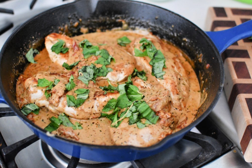 cast iron skillet with sun-dried tomato chicken