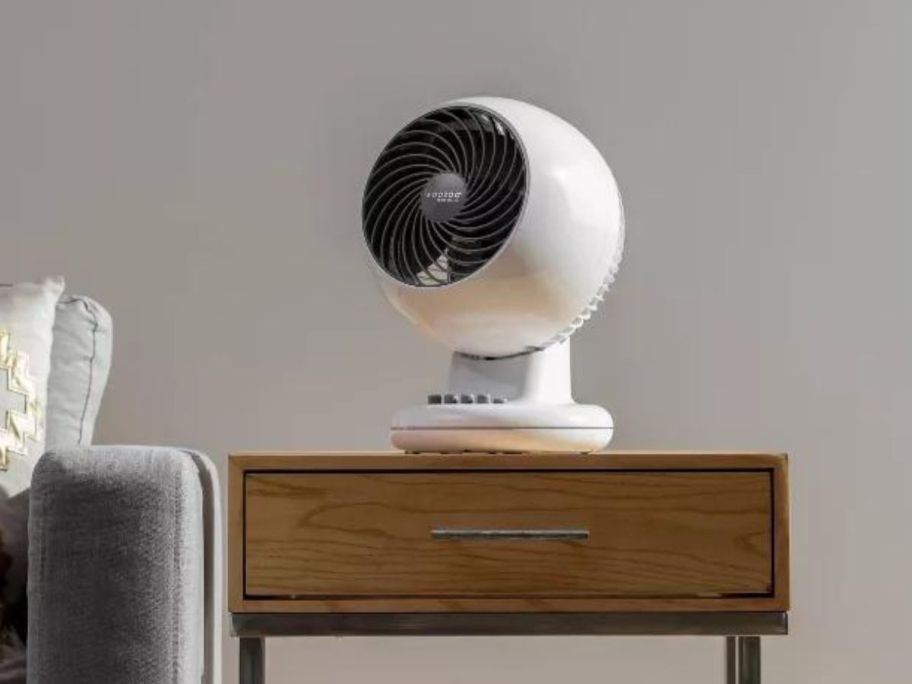 Compact Personal Oscillating Fan White - Woozoo on side table