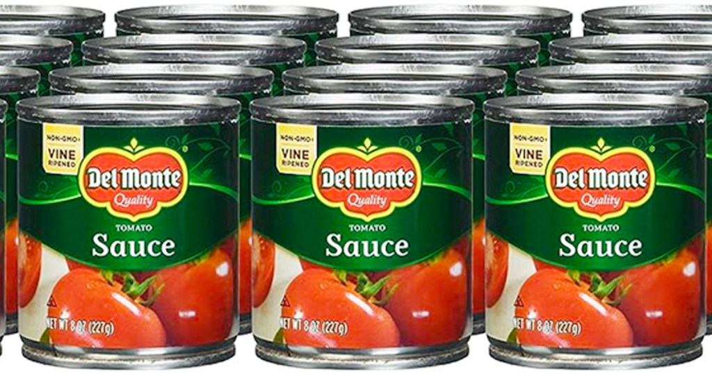 cans of del monte tomato sauce lined up 
