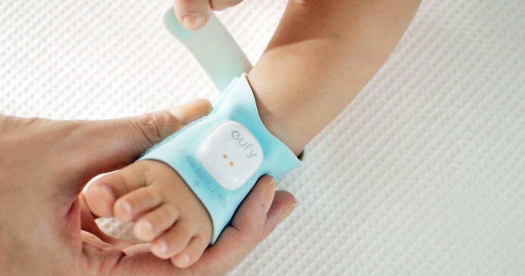 attaching smart sock to baby's foot