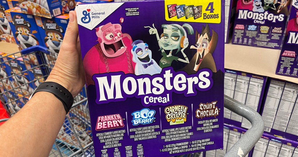 hand holding 4 pack monsters cereal 