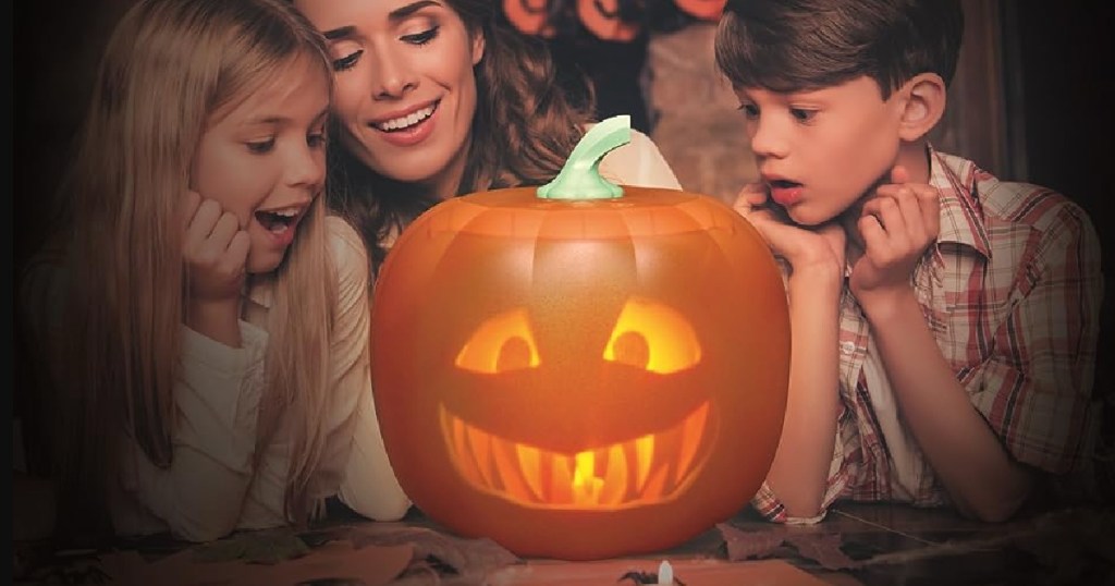 mom and kids peering at jabberin pumpkin