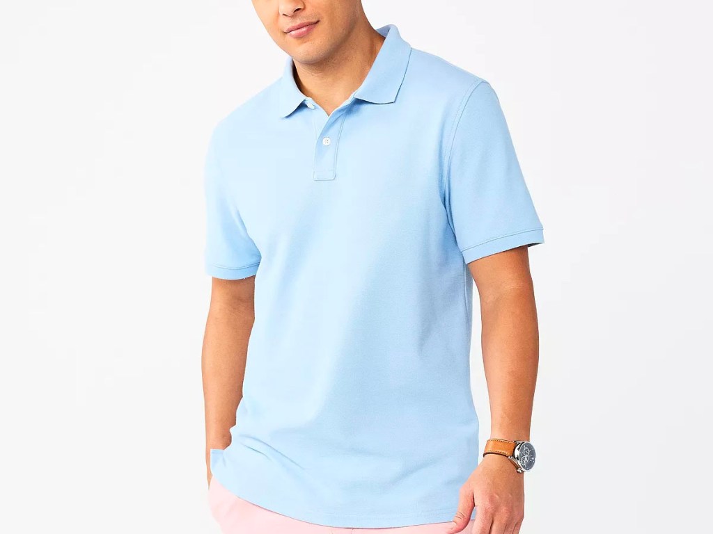 man wearing blue polo shirt