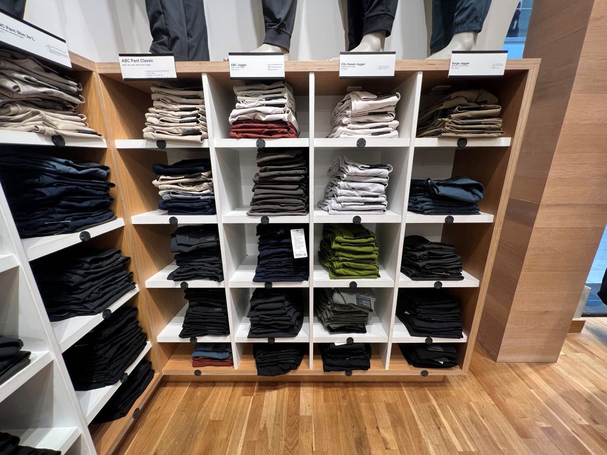 Display of men's joggers at a lululemon store