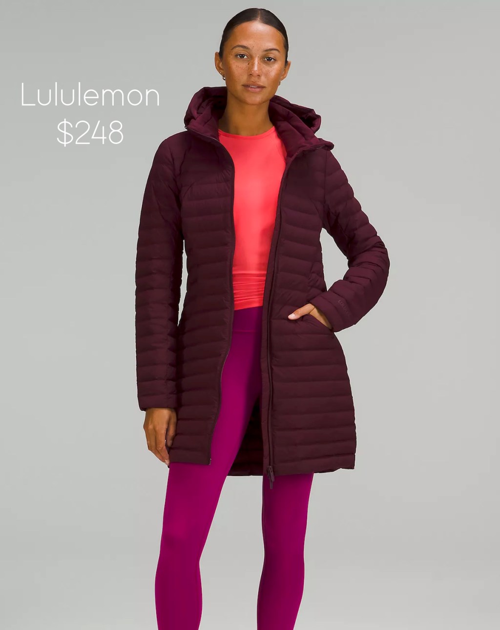 stock photo of woman wearing burgundy lululemon jacket