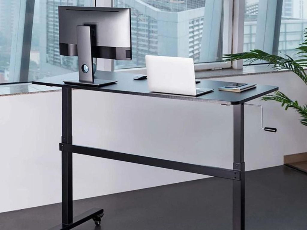 standing desk with computers on it