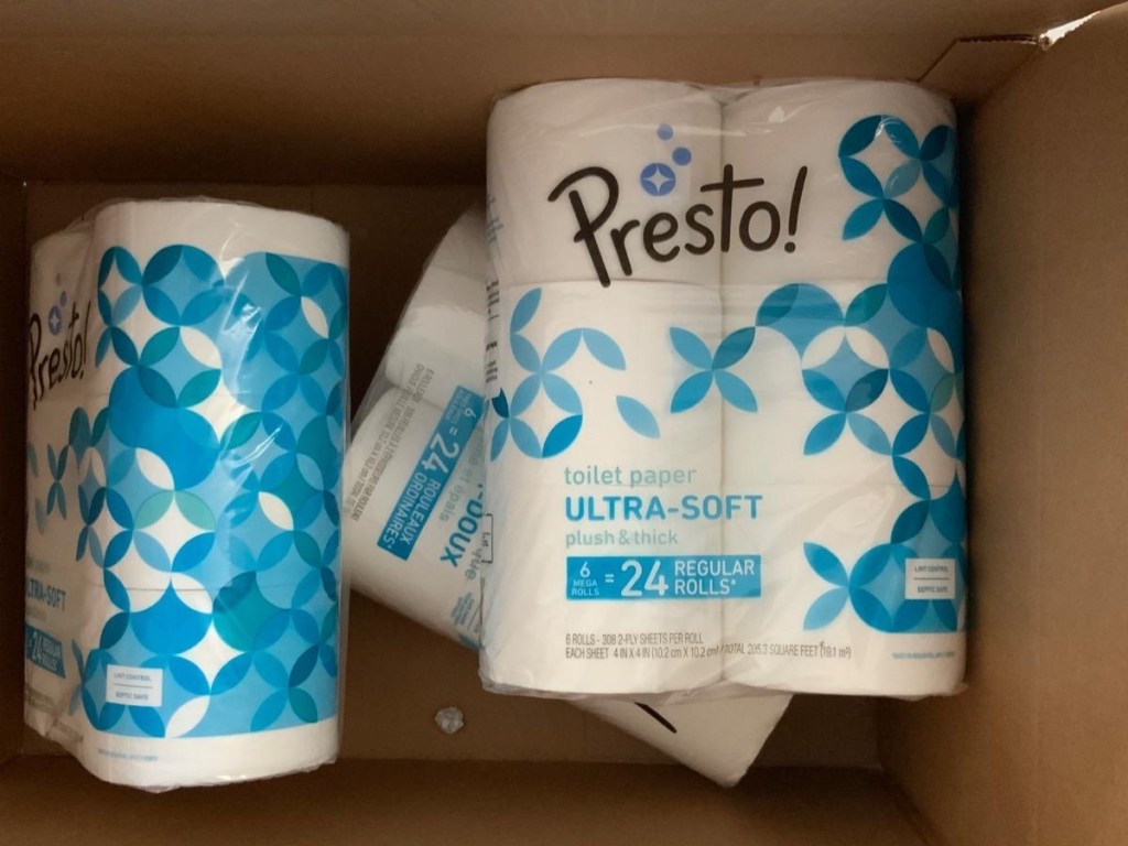packages of Presto! toilet paper inside a cardboard shipping box