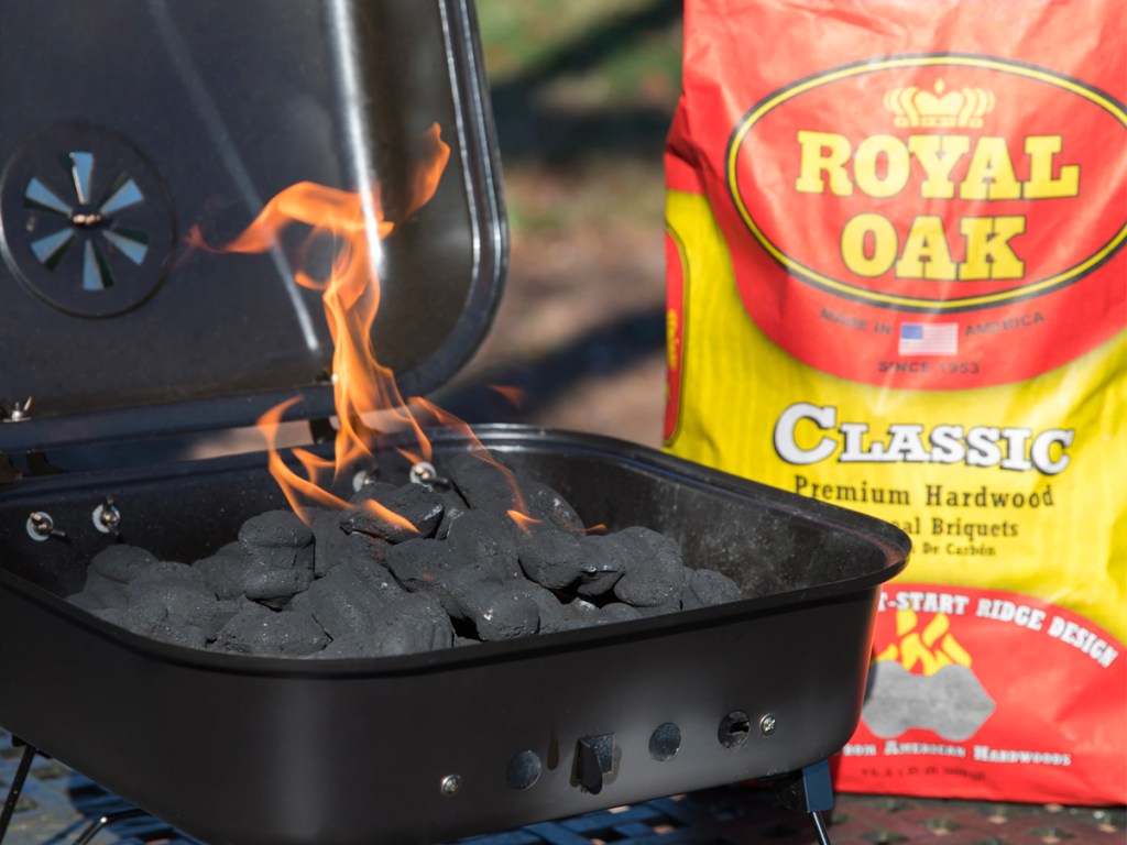 royal oak charcoal bag next to grill