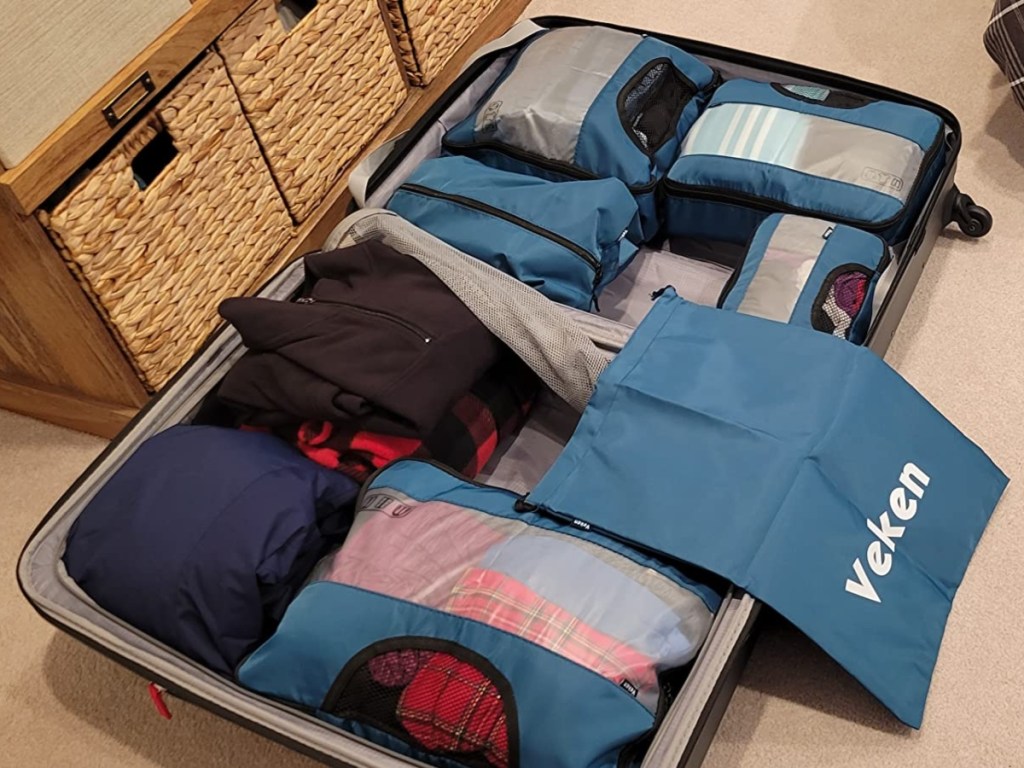filling a suitcase with packing cubes