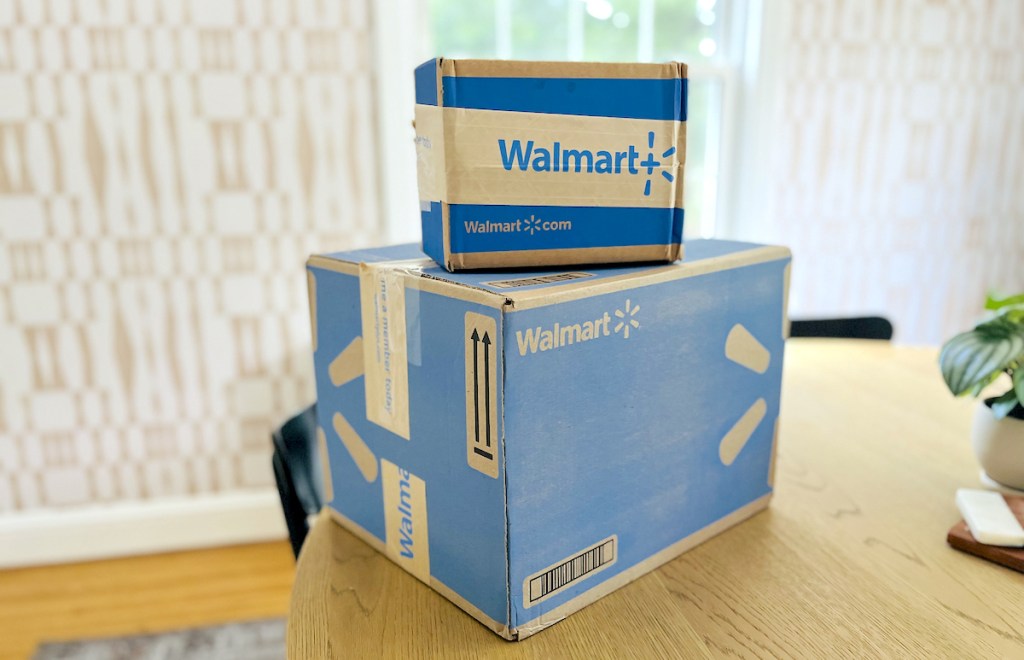 walmart black Friday boxes stacked on wood table