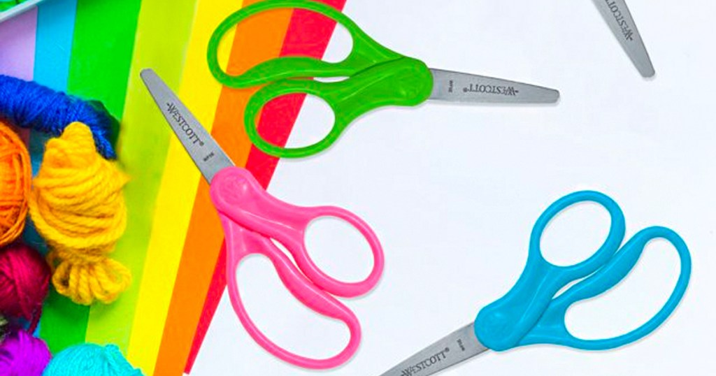 pink, green and blue scissors