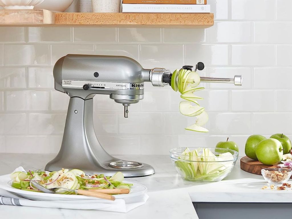 KitchenAid Fruit and Vegetable Spiralizer Attachment shown on Mixer with fruit