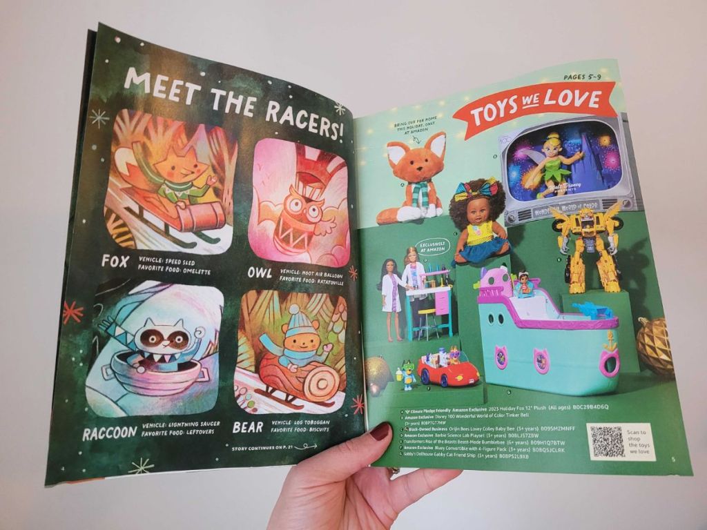 A hand opening the 2023 Amazon Toy Catalog 