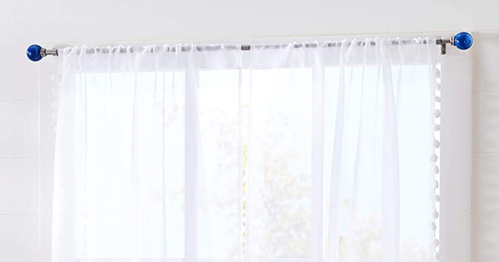 curtain rods hanging in room
