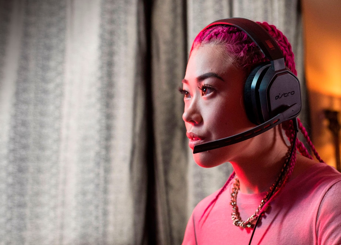 woman wearing an Astro Gaming Headset