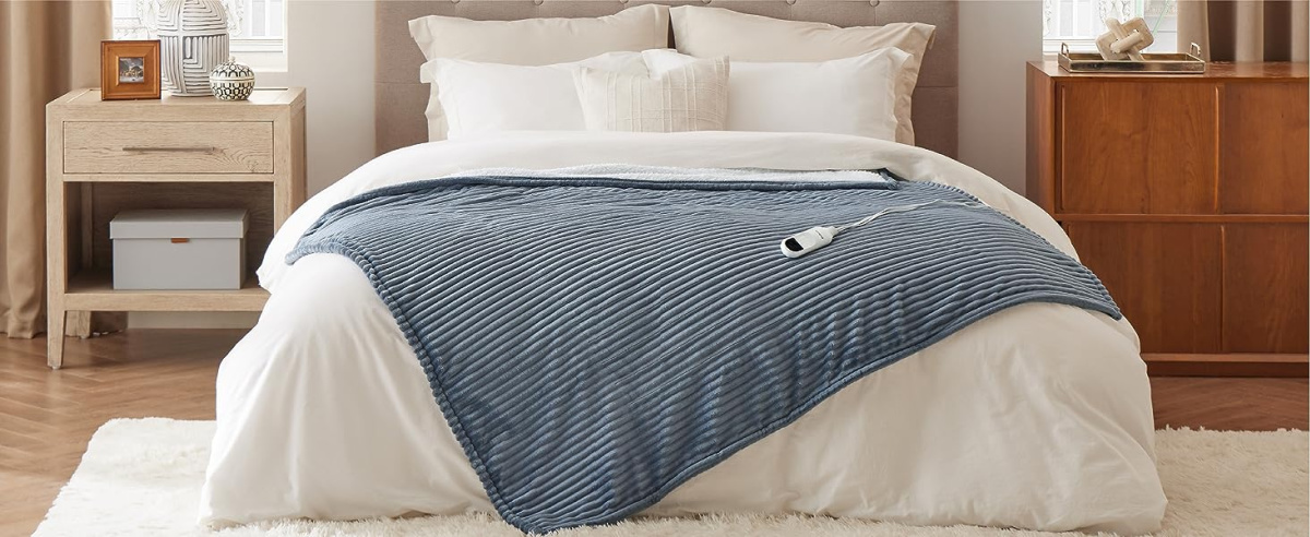 An electric throw on a bed for winter