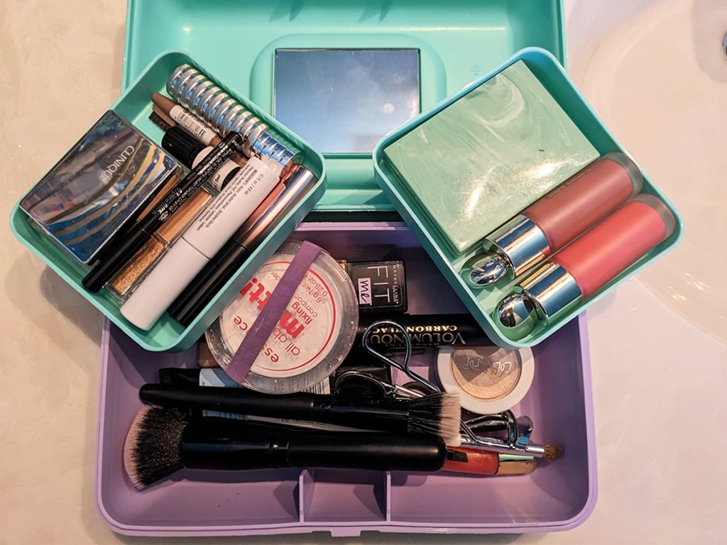 opened caboodles case with makeup inside