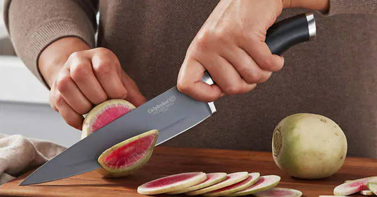 man chopping fruit with calphalon knife set
