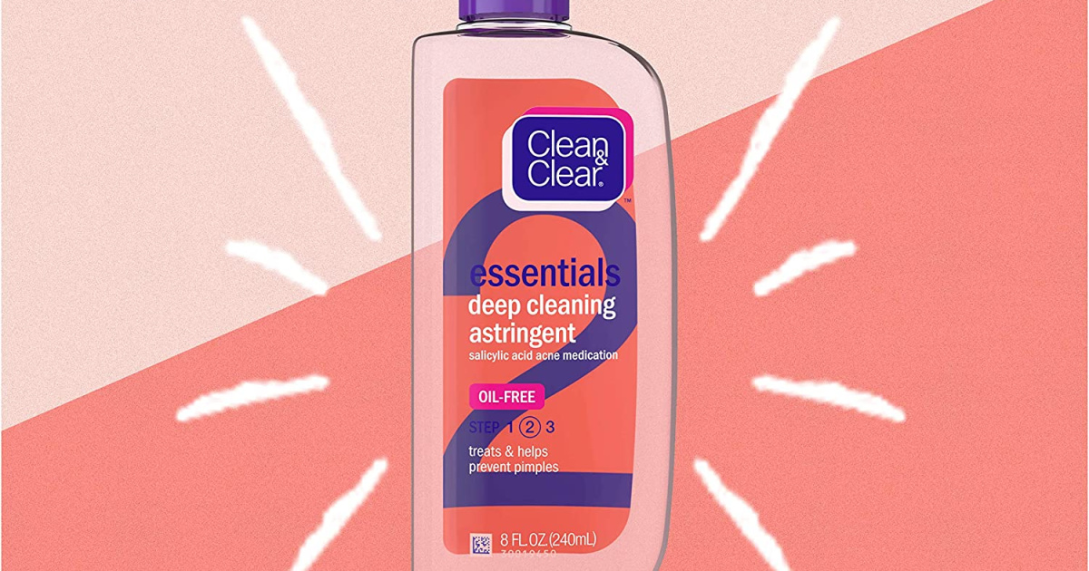 Clean & Clear astringent bottle on pink surface