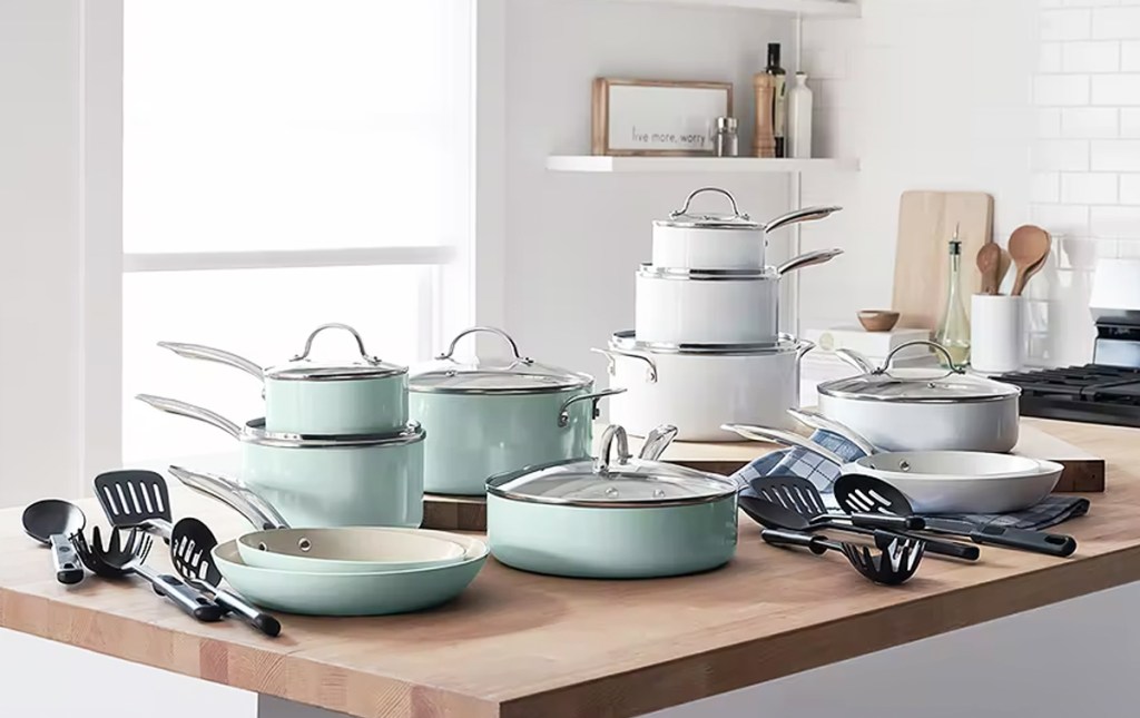 blue and white cookware sets on kitchen counter