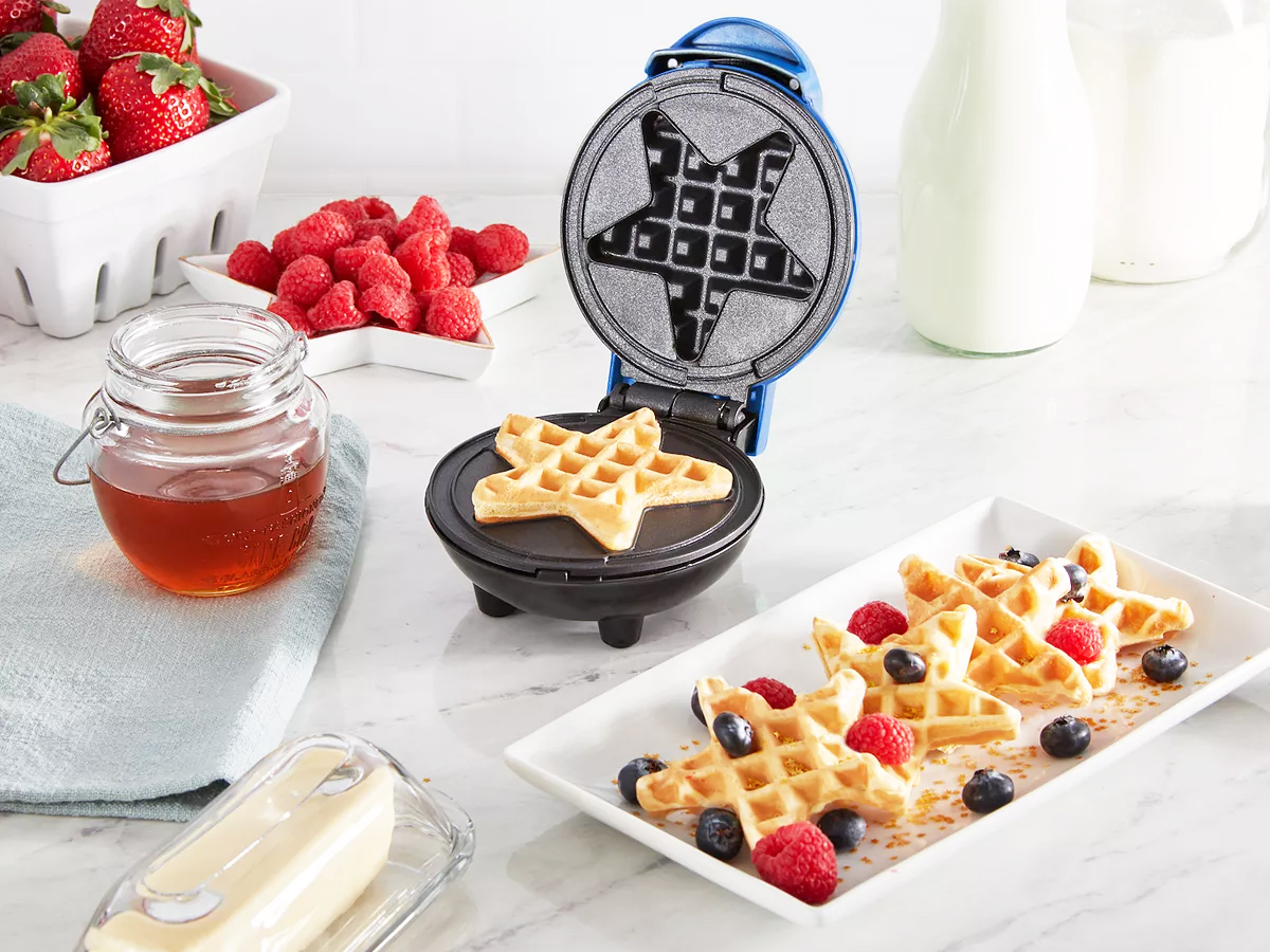 star shaped waffle maker with plate of waffles