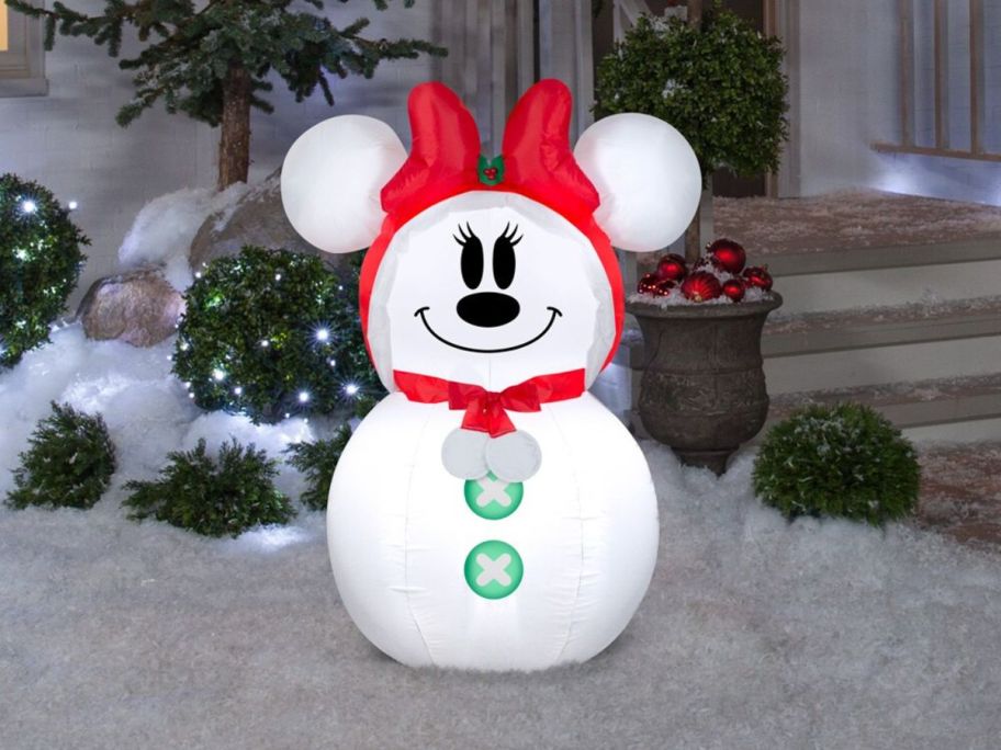 Disney 3.5' LED Minnie Mouse Christmas Inflatable in front of house