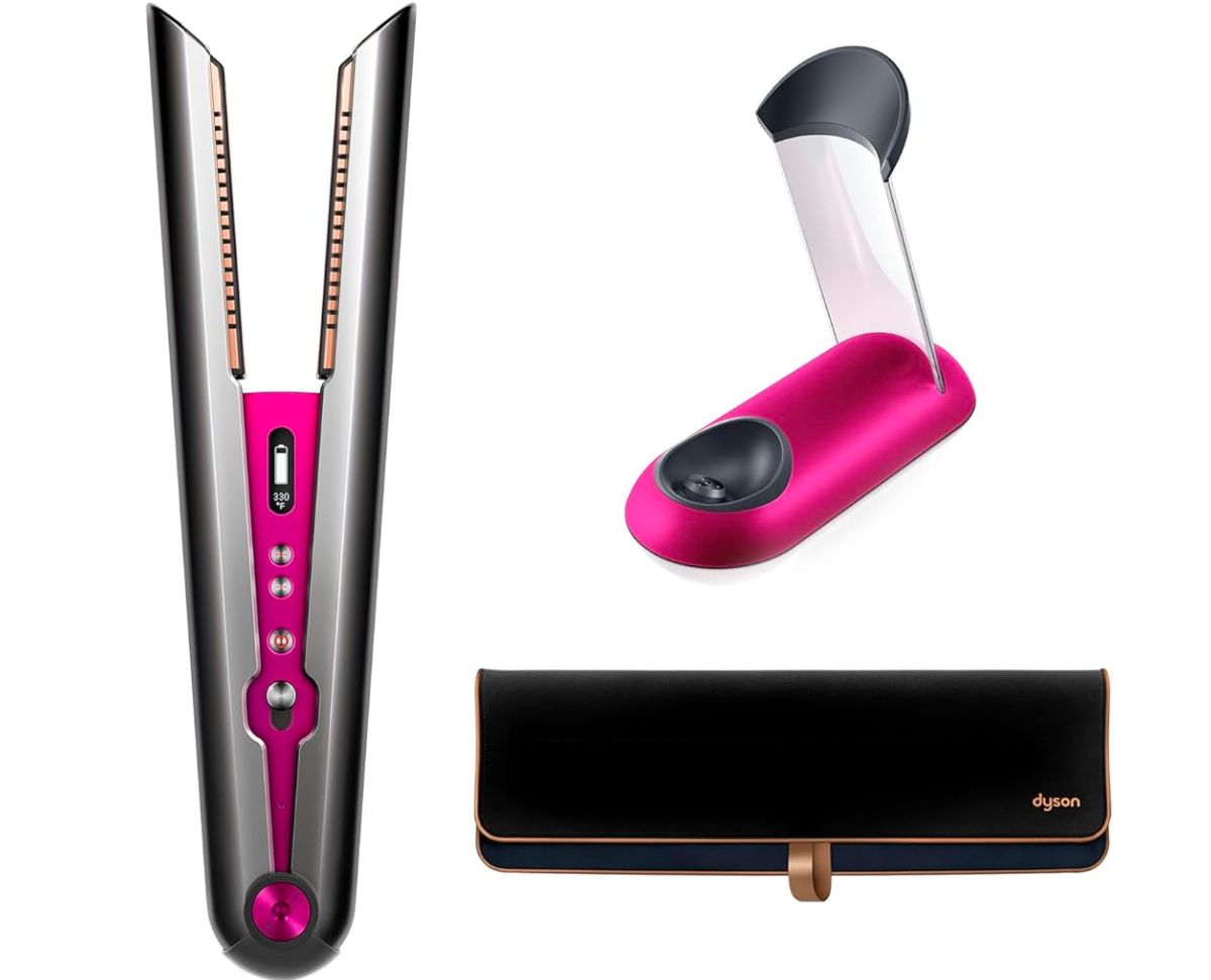 Dyson Corrale Hair Straightener in nickel and fuchsia stock image