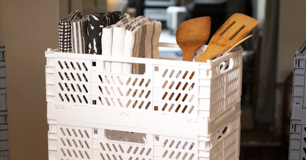 white storage crate with utensils inside