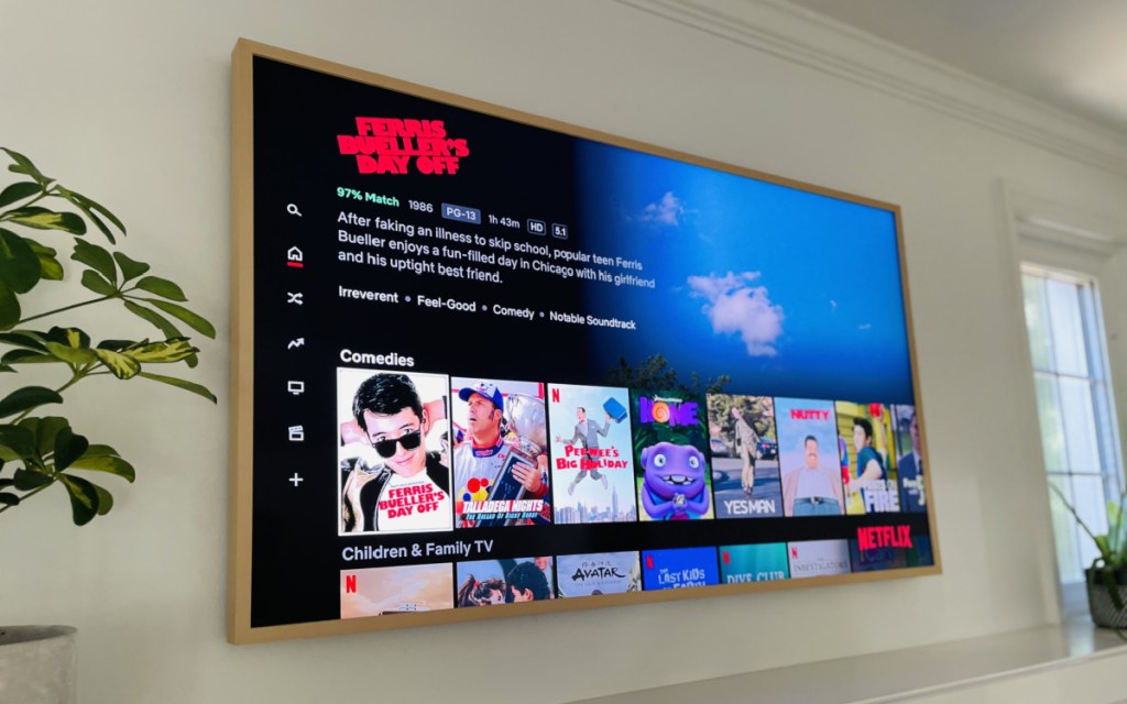 The FRAME TV by Samsung hung above a mantle