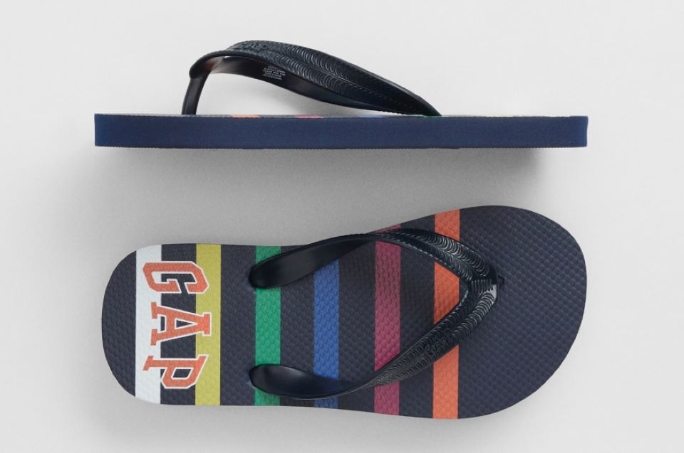 Pair of GAP kids flip flops with colorful stripes on them
