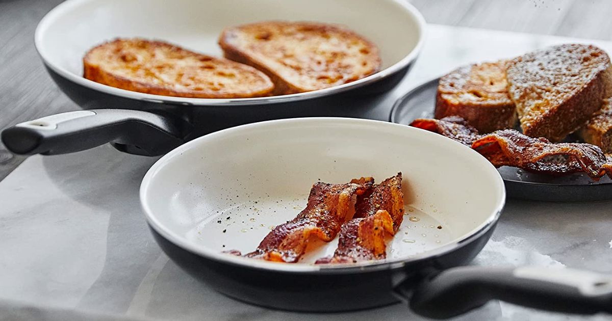 frying pans with bacon and French toast