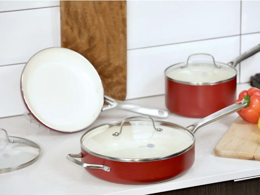 A set of 3 GreenPan Ceramic Pans in red